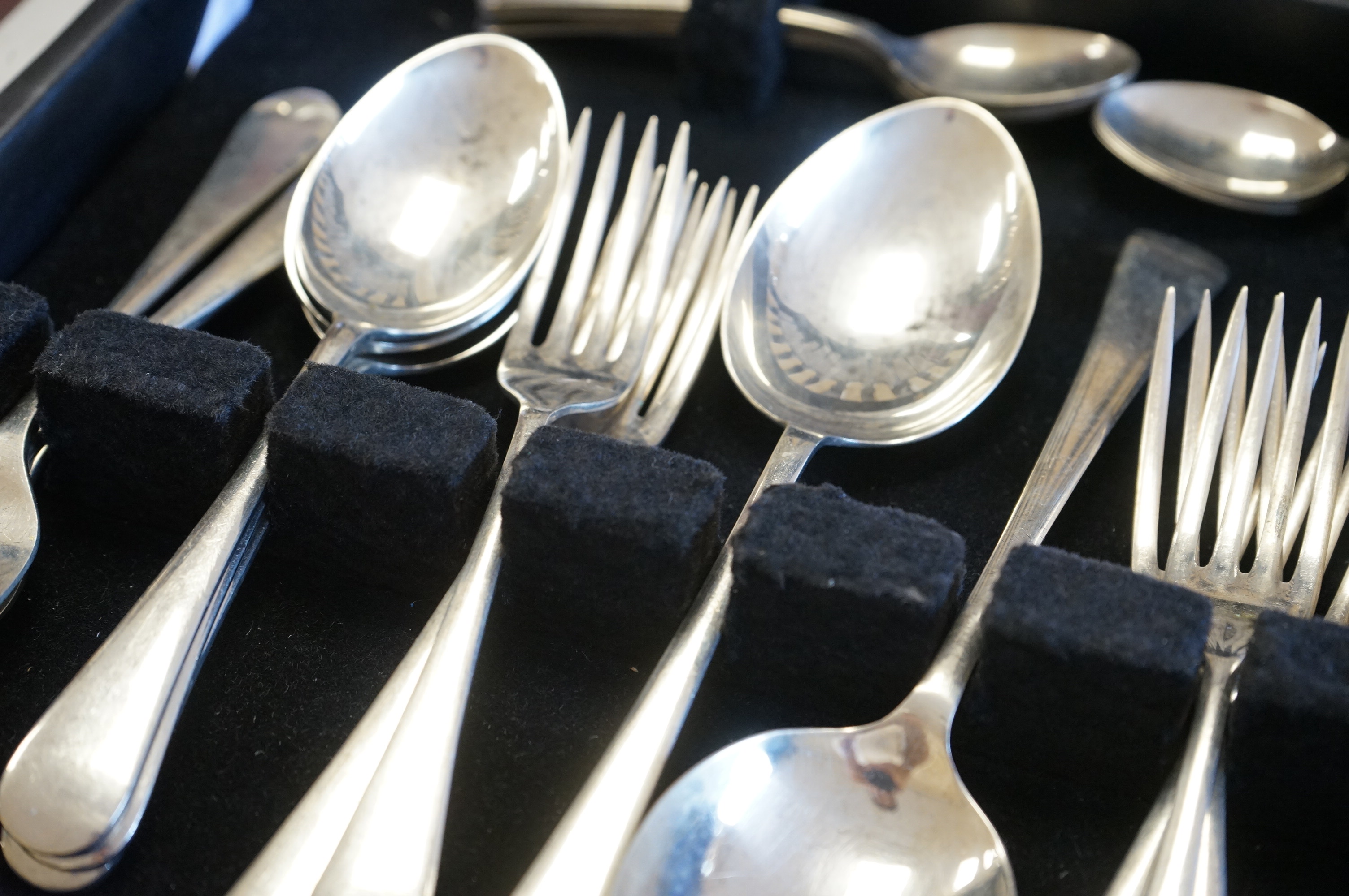 Four cased canteens of silver plated flatware including Kings pattern and Mappin plate